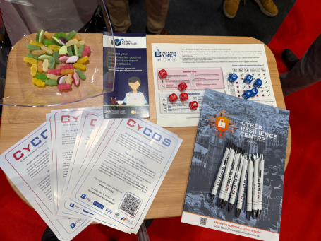 Info, pens and Cyber Defence Dice ... and sweets.