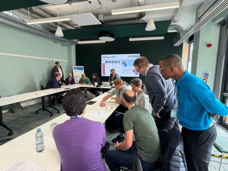 CyCOS Community Event - 18 May 2026 Red team versus blue team. The community members are introduced to an awareness-raising game of Cyber Defence Dice.